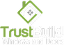 Close-up of the "TrustBuild Windows and Doors" logo, featuring a green and gray stylized house icon shaped like a diamond with a chimney.
