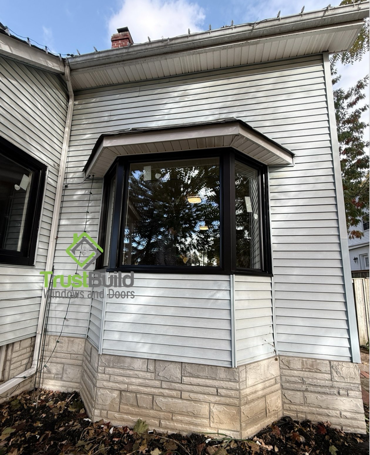 Energy efficient vinyl windows installed in Barrie home showing triple pane glass